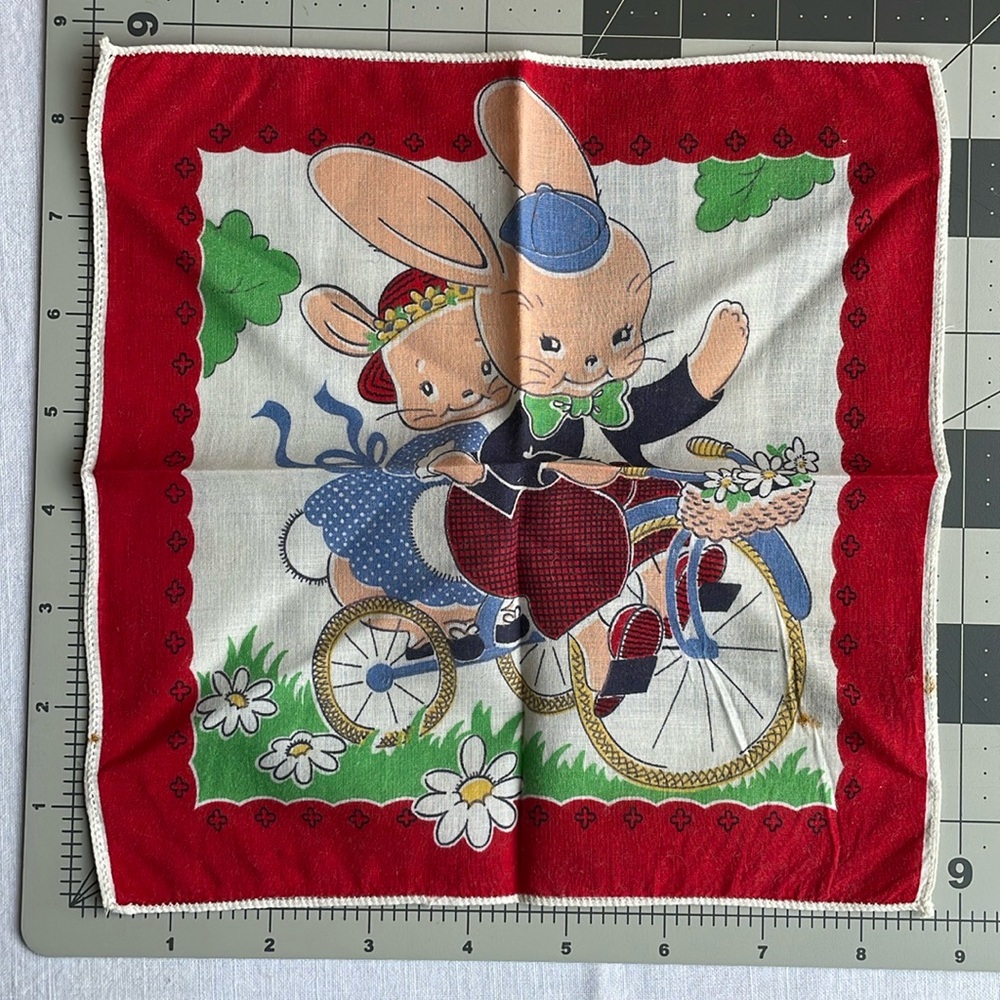 Vintage (ca 1950's) handkerchief, bunnies on a bicycle, approx. 9" x 9"